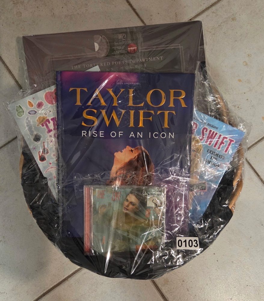 Taylor Swift basket with books, CDs, and stickers